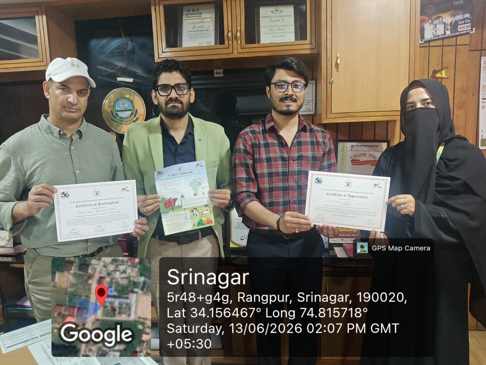Our team receiving the certificate together